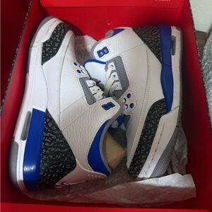 White and blue Jordan 3 Retro trainers